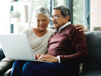 couple looking at laptop